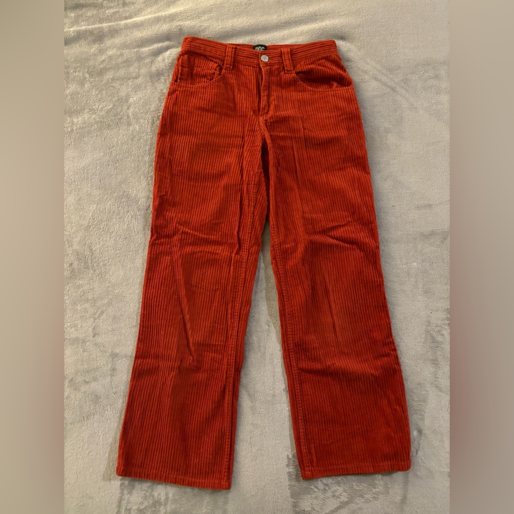 Bright burnt orange corduroy pants